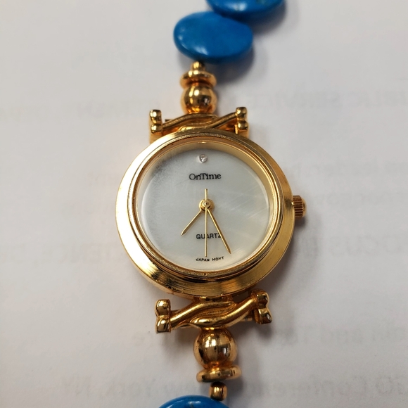 ON TIME WATCH GOLDTONE WITH MOP FACE AND TURQUOISE BAND 8in. - Picture 4 of 4